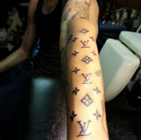 lv hand tattoo|Lv tattoo gang meaning.